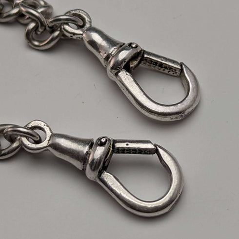 Cadena doble Albert de plata esterlina, antigüedad británica de alrededor de 1900, 34 g, con dije de borla
