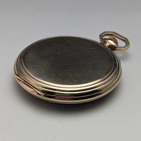 Reloj de bolsillo antiguo inglés Russell de los años 1920, frente abierto chapado en oro, en buen estado de funcionamiento