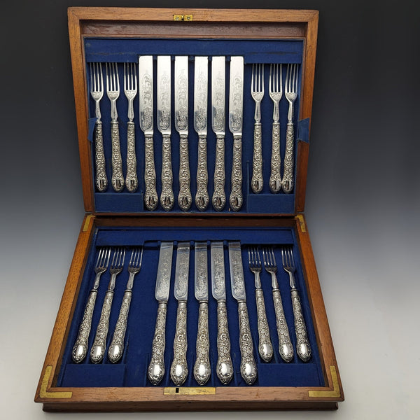 Around 1878 British antique silver plated cutlery set of 11 knives and 12 forks in a wooden box William Gallimore