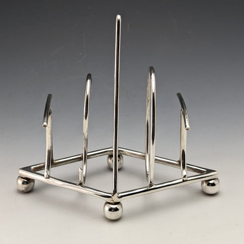 Estante para tostadas vintage de plata chapada británica con la palabra "TOAST"