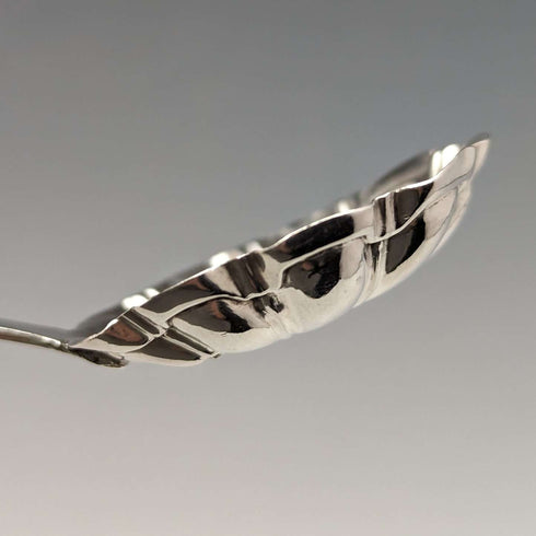 Early 19th century British antique sterling silver tea caddy spoon (with translation)