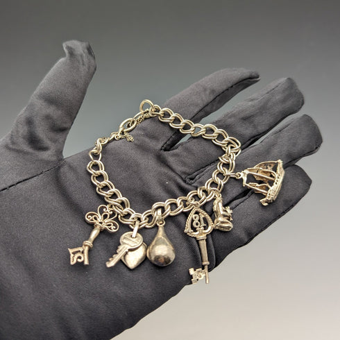 1973年 英国ヴィンテージ 純銀製 チャームブレスレット 26g