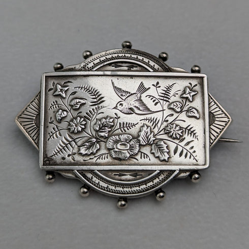 British antique silver flower and bird design brooch