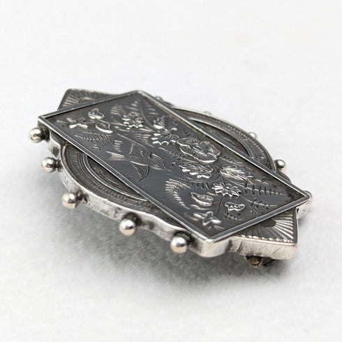 British antique silver flower and bird design brooch