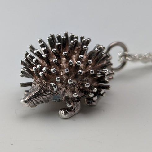 British vintage hedgehog charm pendant and sterling silver necklace