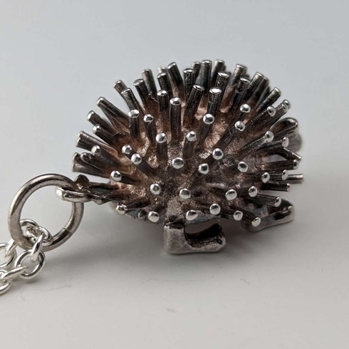 British vintage hedgehog charm pendant and sterling silver necklace