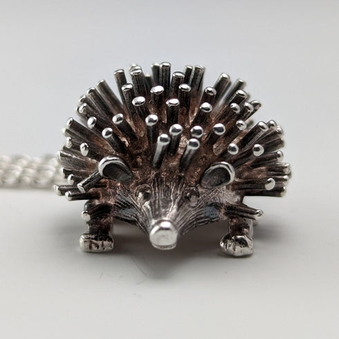 British vintage hedgehog charm pendant and sterling silver necklace
