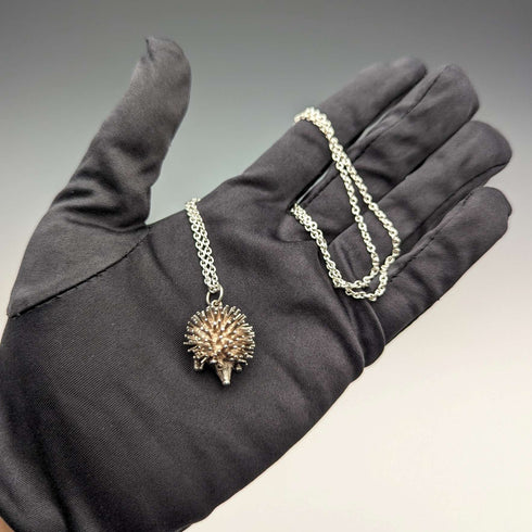 British vintage hedgehog charm pendant and sterling silver necklace