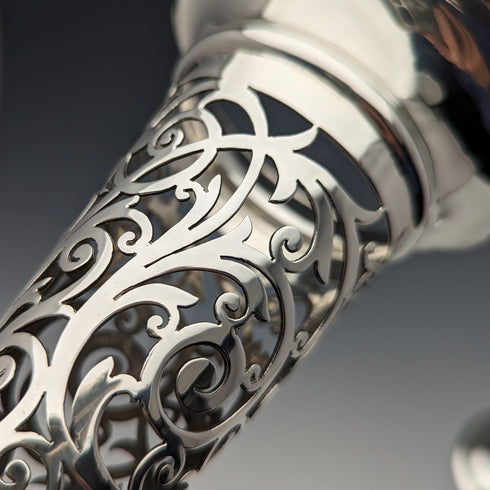 Circa 1901 British antique sterling silver vase pair with earring decoration, total weight 312g, Josiah Williams