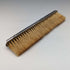 Antique American sterling silver brush with embossed handle