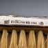 Antique American sterling silver brush with embossed handle