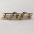 Antique 9ct gold brooch with green stones and pearls
