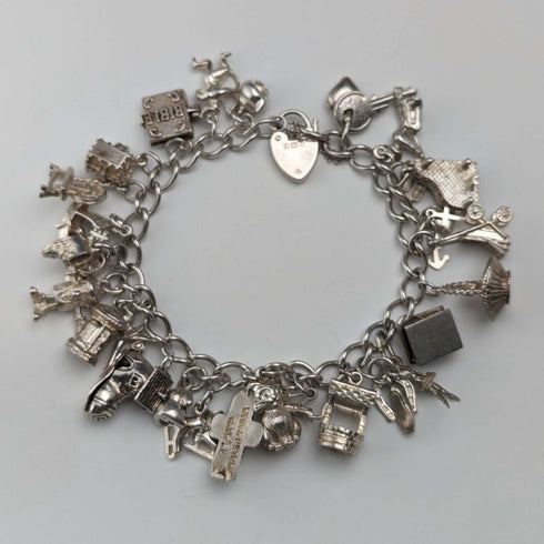 1983 British vintage sterling silver charm bracelet, 53g