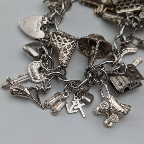 1983 British vintage sterling silver charm bracelet, 53g