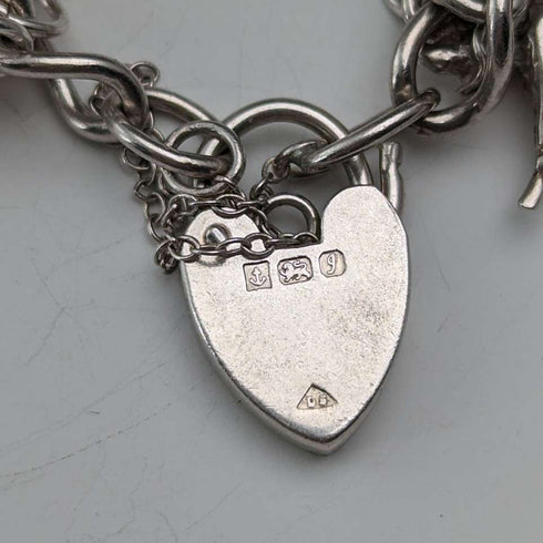 1983 British vintage sterling silver charm bracelet, 53g
