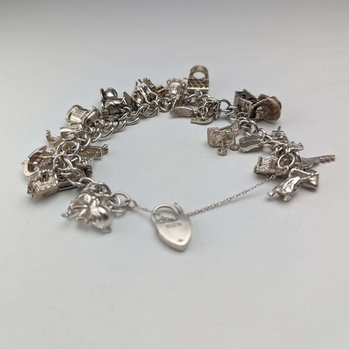 1983 British vintage sterling silver charm bracelet, 53g