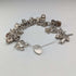 1983 British vintage sterling silver charm bracelet, 53g