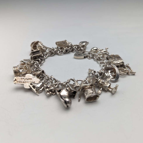 1983 British vintage sterling silver charm bracelet, 53g