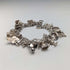 1983 British vintage sterling silver charm bracelet, 53g