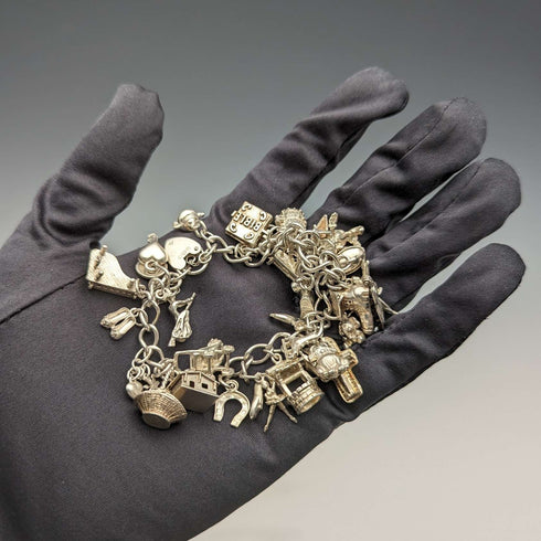 1983 British vintage sterling silver charm bracelet, 53g