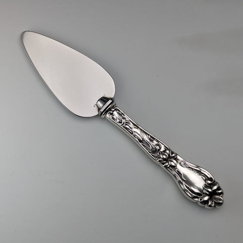 Circa 1910 American antique small cake slicer with sterling silver handle