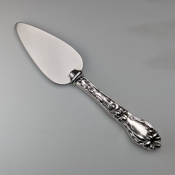 Circa 1910 American antique small cake slicer with sterling silver handle