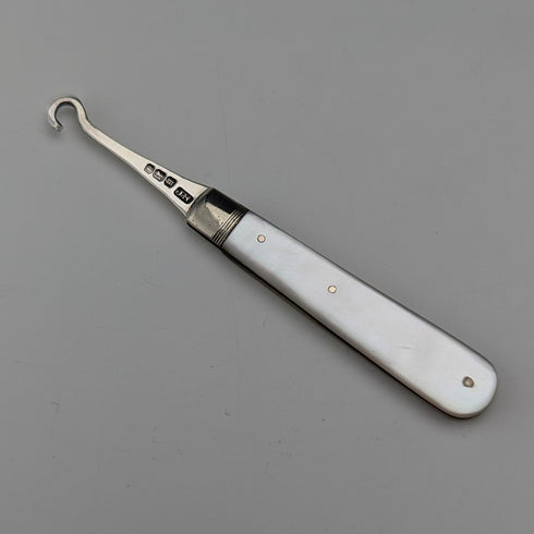 1904 British antique white mother-of-pearl handle and pure silver button hook by John Holmes