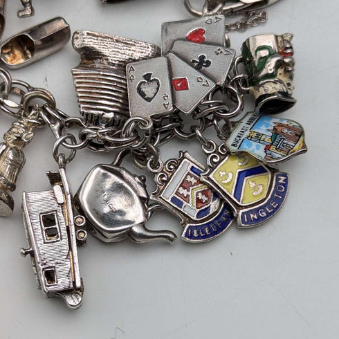 1970s British vintage sterling silver charm bracelet, 89g