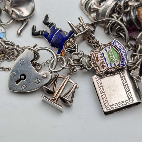 1970s British vintage sterling silver charm bracelet, 89g