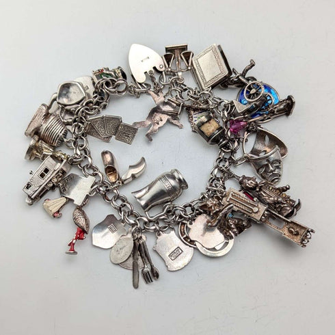 1970s British vintage sterling silver charm bracelet, 89g