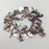 1970s British vintage sterling silver charm bracelet, 89g