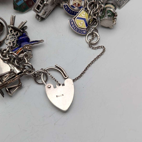 1970s British vintage sterling silver charm bracelet, 89g