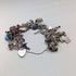 1970s British vintage sterling silver charm bracelet, 89g