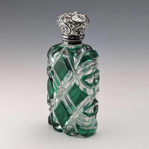 Antique British silver-lidded green cut glass portable perfume bottle