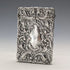 Antique American sterling silver card case with embossed decoration, 75g