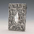 Antique American sterling silver card case with embossed decoration, 75g