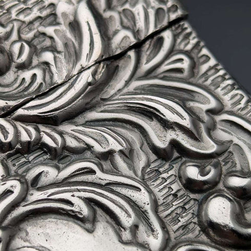 Antique American sterling silver card case with embossed decoration, 75g