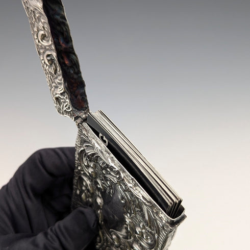 Antique American sterling silver card case with embossed decoration, 75g