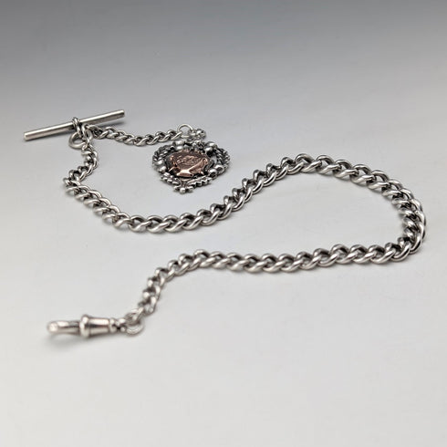Circa 1910 British antique sterling silver Albert chain, 52g, sterling silver emblem fob