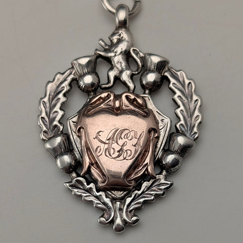 Circa 1910 British antique sterling silver Albert chain, 52g, sterling silver emblem fob