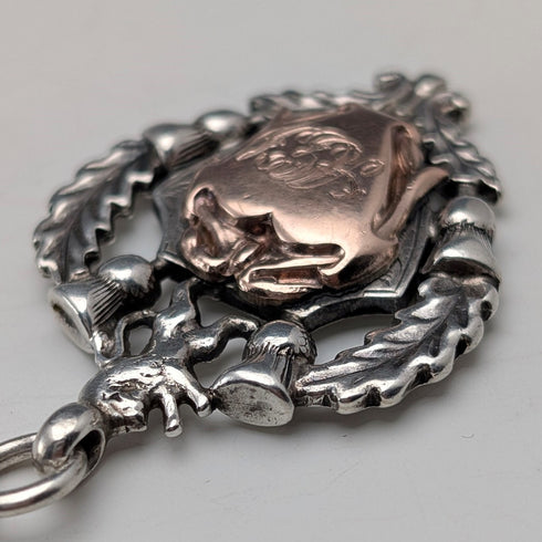 Circa 1910 British antique sterling silver Albert chain, 52g, sterling silver emblem fob