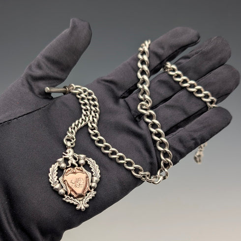 Circa 1910 British antique sterling silver Albert chain, 52g, sterling silver emblem fob