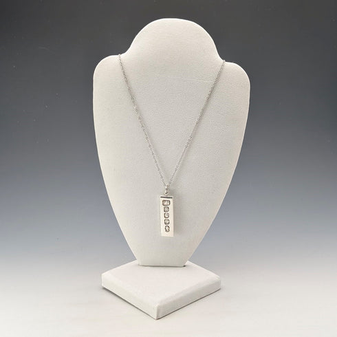 1977 British Britannia silver ingot pendant, 1/2 troy ounce, with necklace