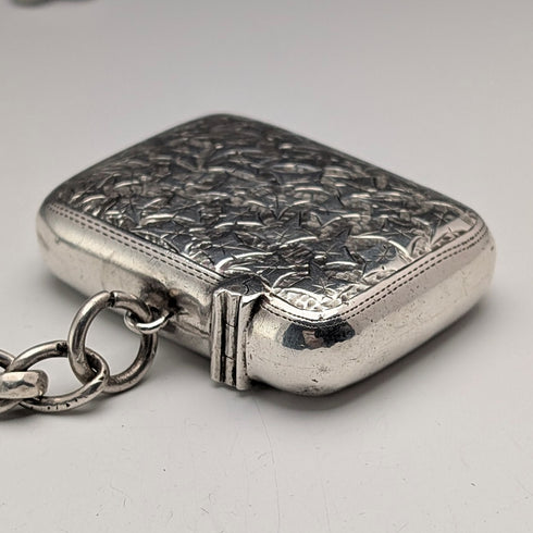 Circa 1900 British antique sterling silver Albert chain, 80g, with sterling silver Vesta case