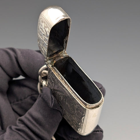 Circa 1900 British antique sterling silver Albert chain, 80g, with sterling silver Vesta case