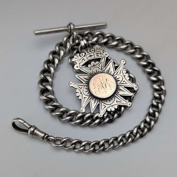 Circa 1900 British antique sterling silver Albert chain, 56g sterling silver medal fob