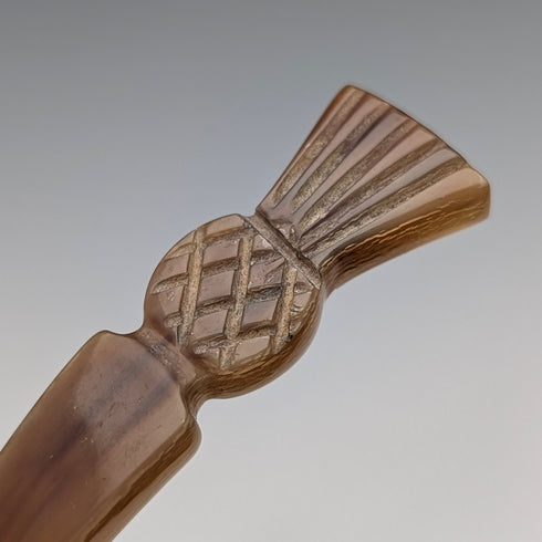 Antique British horn tea caddy spoon with thistle decoration