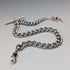 Circa 1900 British antique sterling silver Albert chain, 49g, sterling silver swallow fob