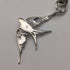 Circa 1900 British antique sterling silver Albert chain, 49g, sterling silver swallow fob