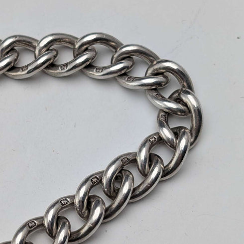 Circa 1900 British antique sterling silver Albert chain, 49g, sterling silver swallow fob
